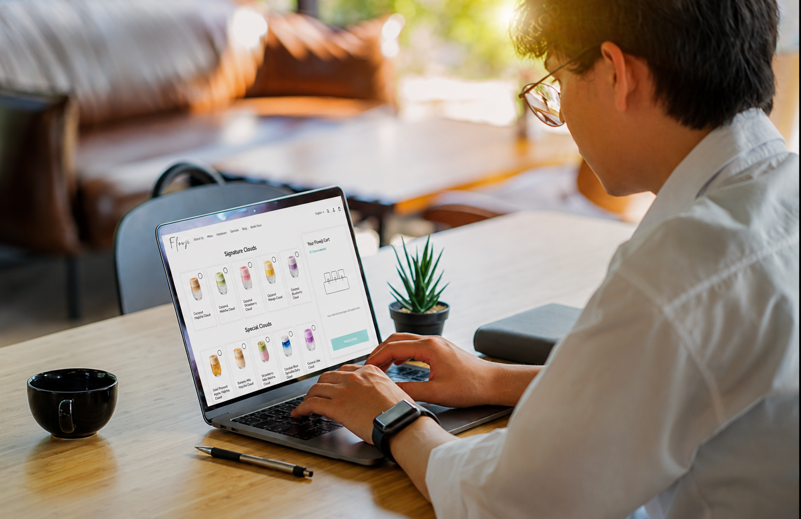 A man with the laptop choosing the Flowji flavors for his cart